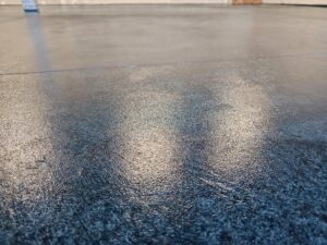 finished stained concrete garage floor teal